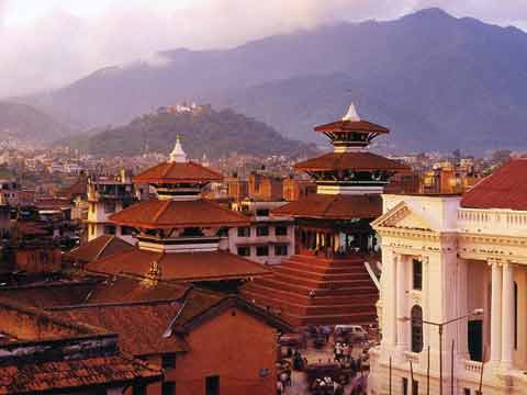 
Kathmandu Durbar Square With Swayambhunath On Hill In Background - Nepal: Kathmandu Valley, Chitwan, Annapurna, Mustang, Everest (Lonely Planet Pictorial) book
